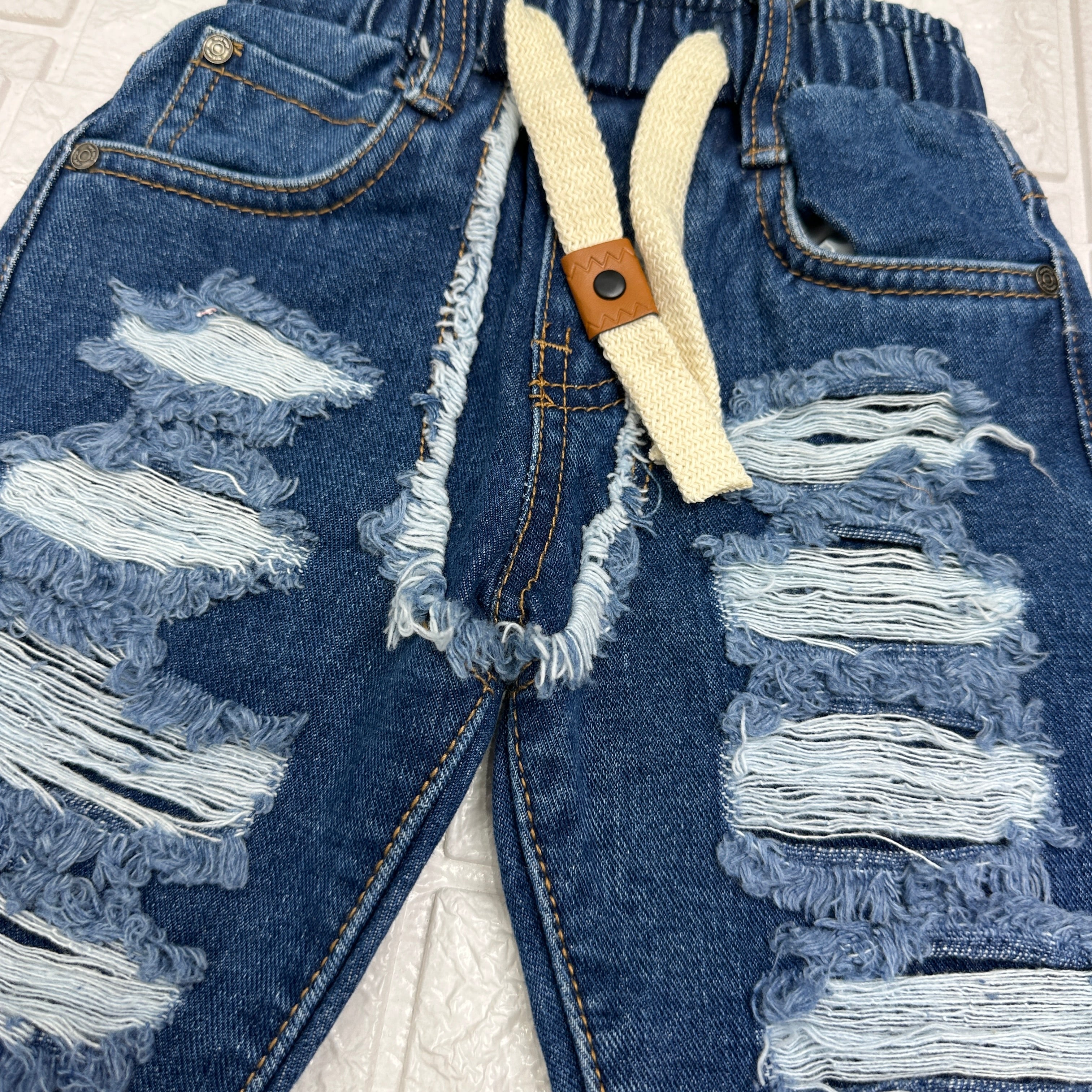 Jeans strappi