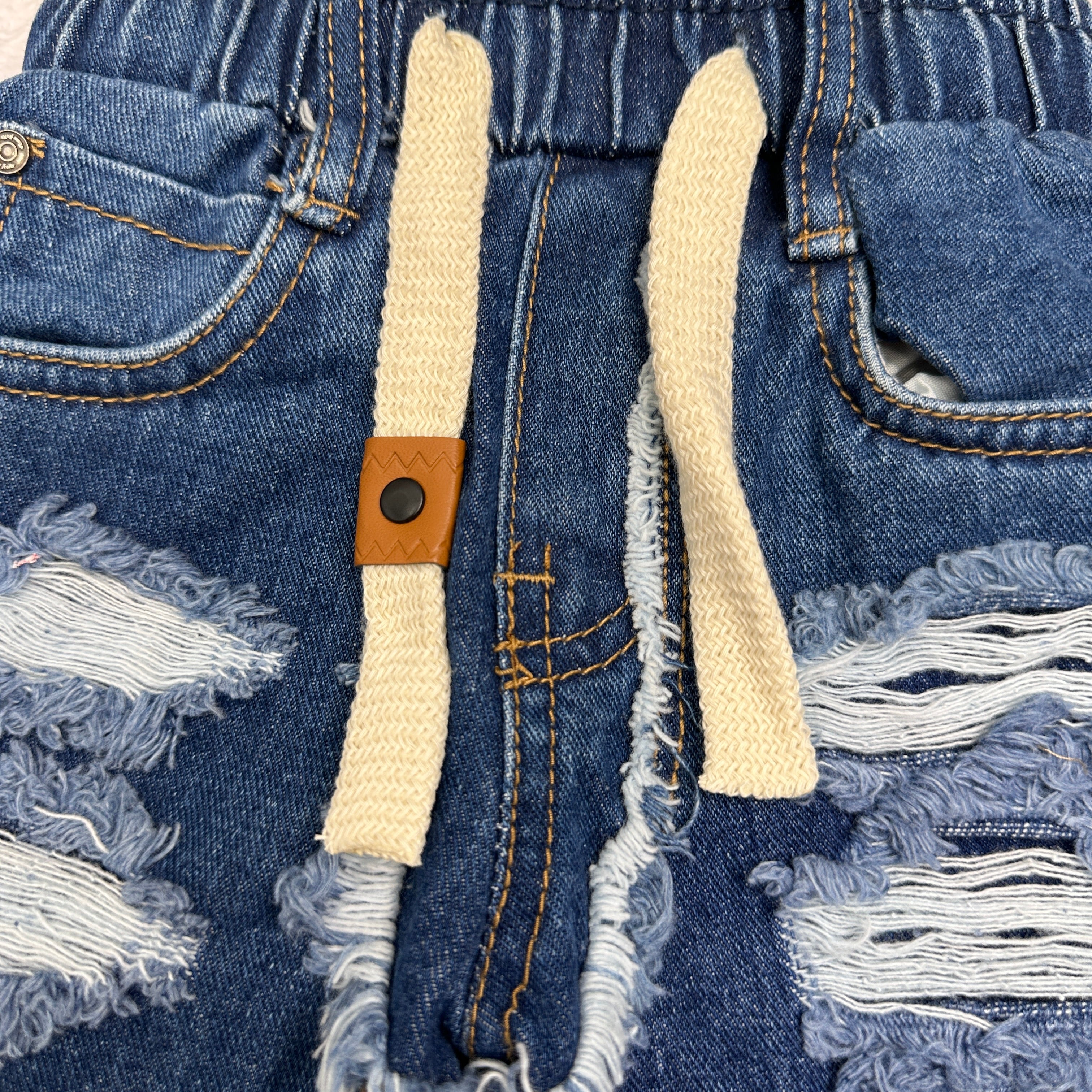 Jeans strappi