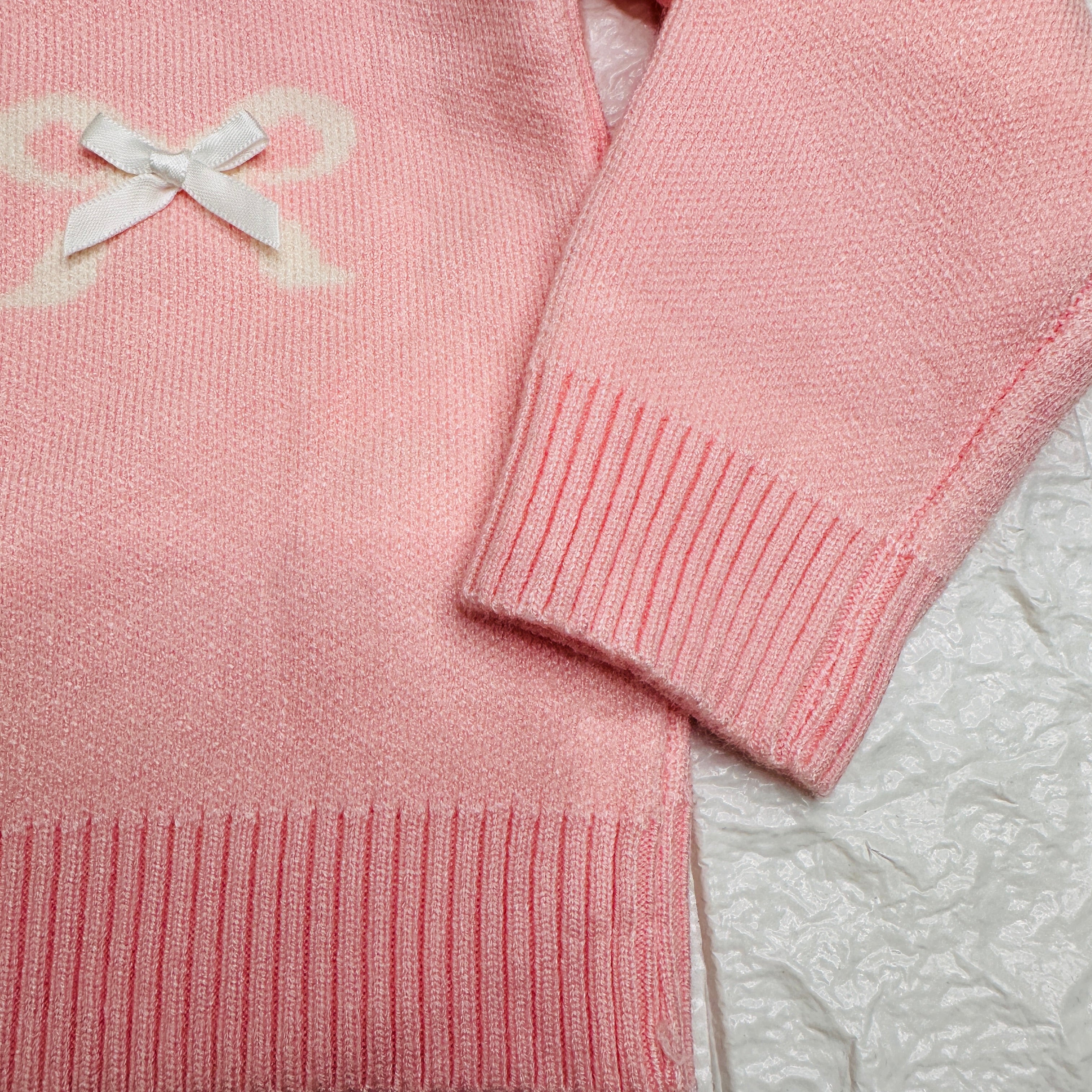 Maglioncino fiocchetti rosa