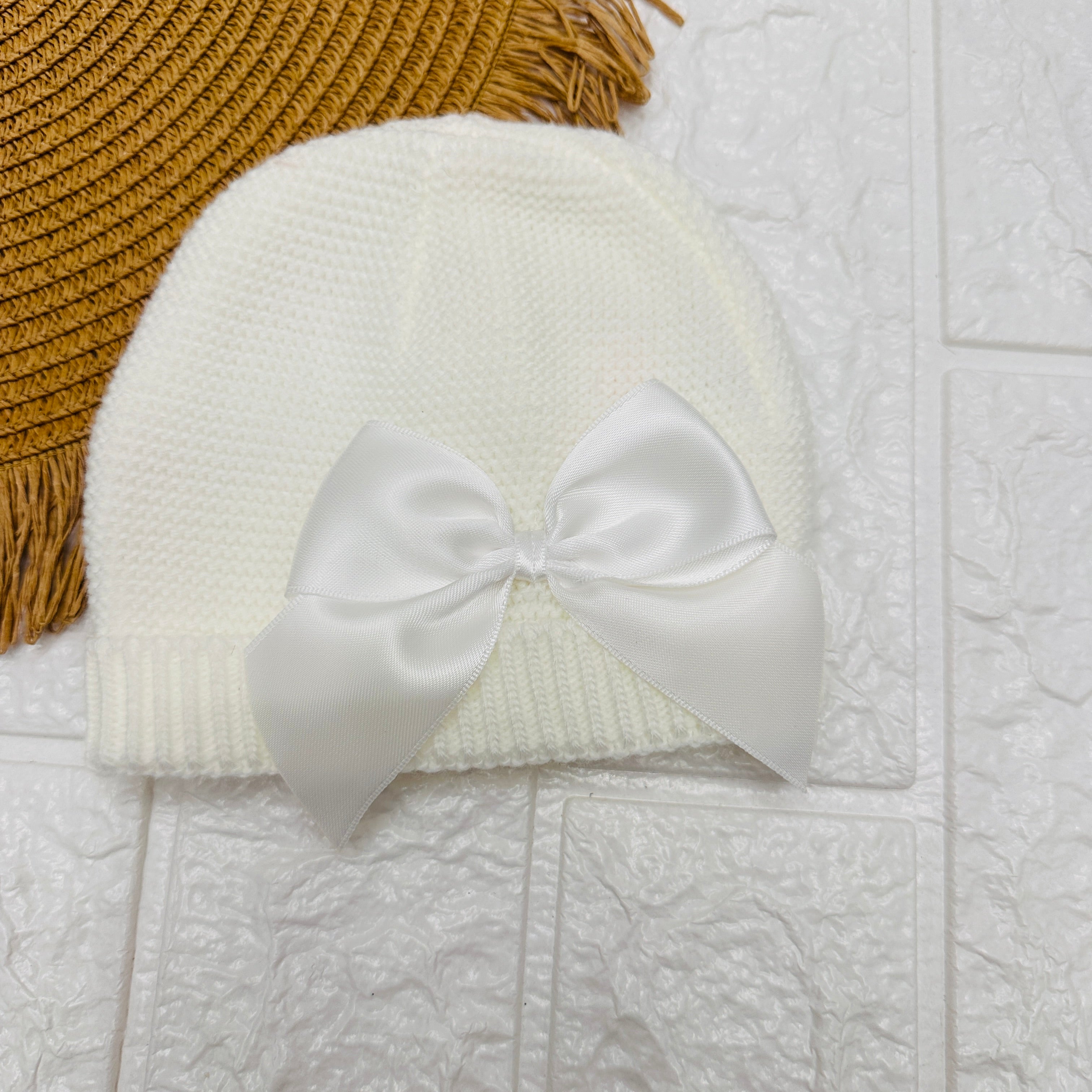 Cappellino fiocco panna