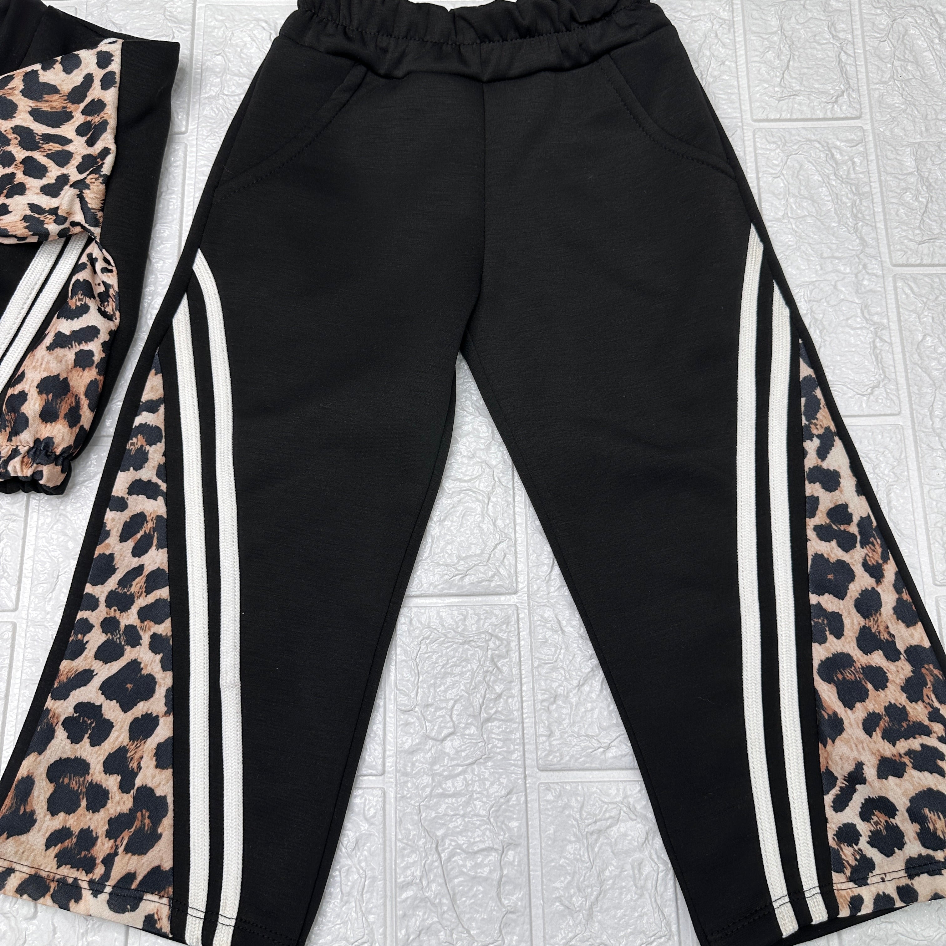 Tuta  bimba animalier nera