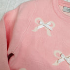 Maglioncino fiocchetti rosa
