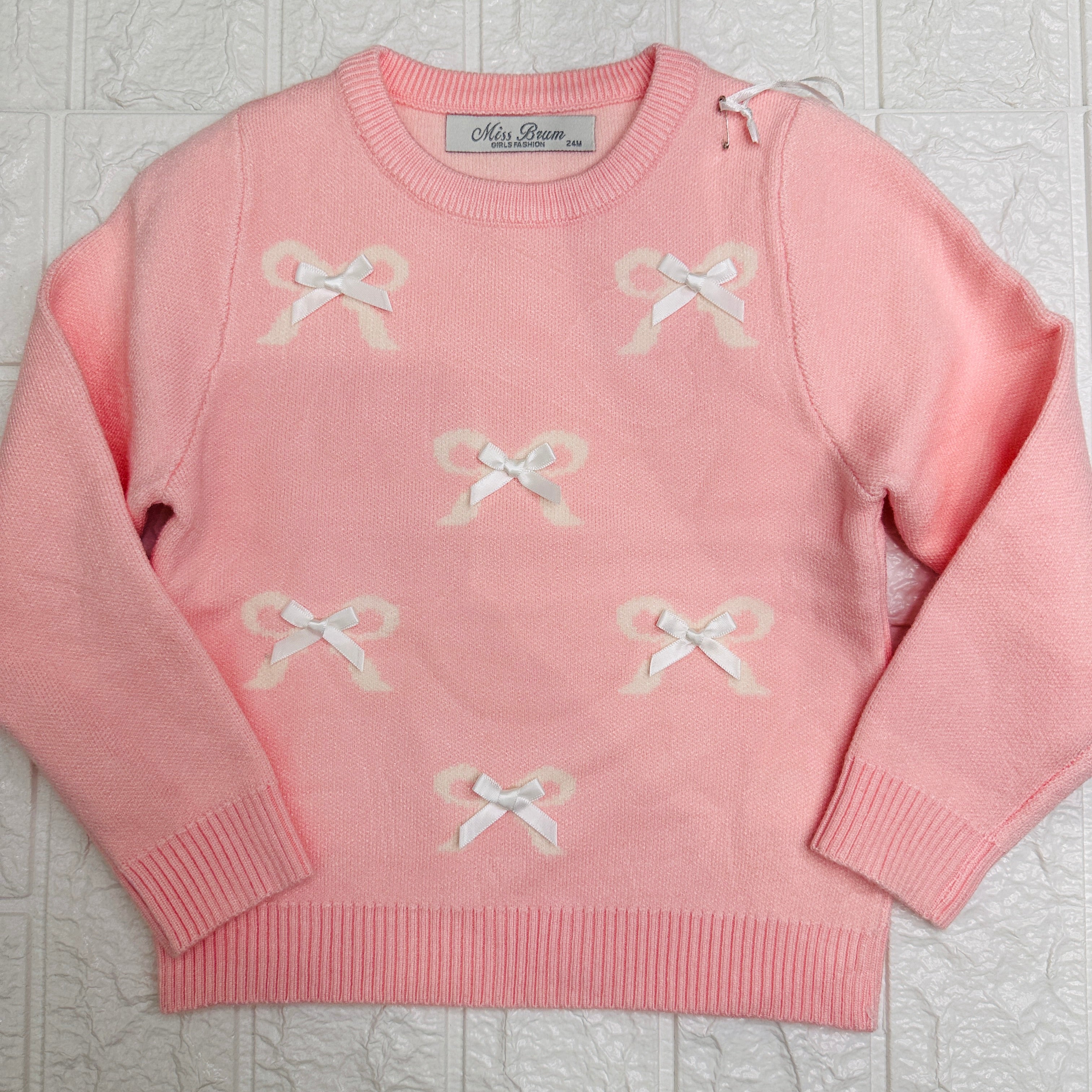 Maglioncino fiocchetti rosa