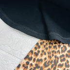 maglia e leggigs animalier nera