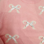 Maglioncino fiocchetti rosa
