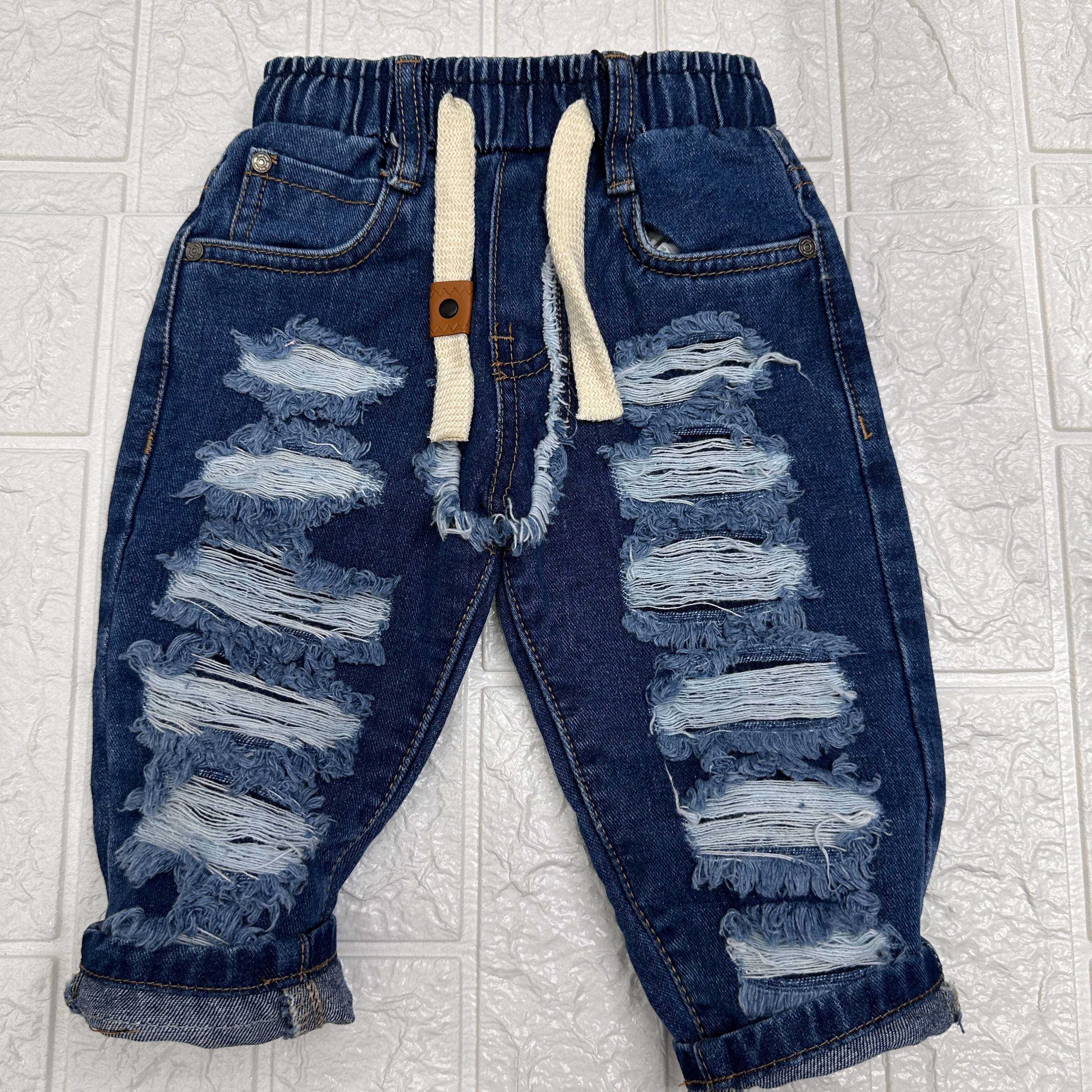Jeans strappi