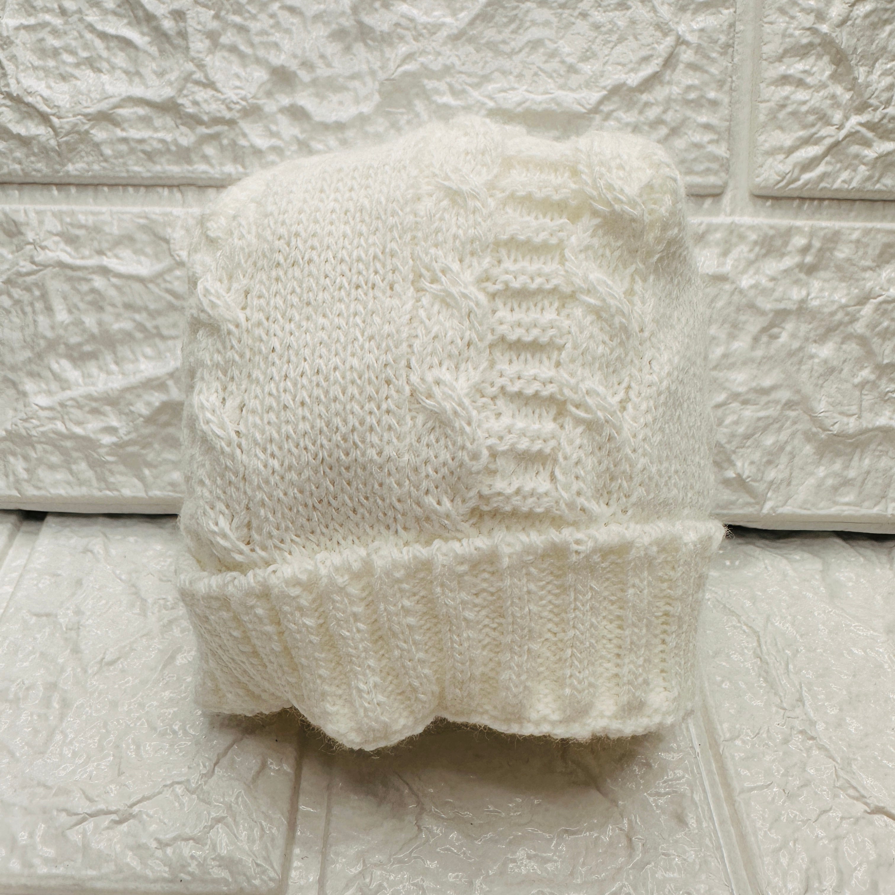Cappello treccia in lana panna